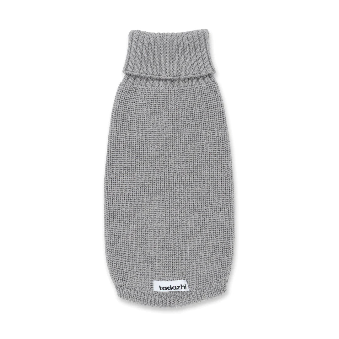 Hondentrui GrijsZachte en tijdloze hondentrui in de kleur beige. Gemaakt van de fijnste merinowol. Het breiwerk maakt de omtrek flexibel.Met deze verfijnde wollen hondentrui voor alTadazhiwafwafHondentrui Grijs