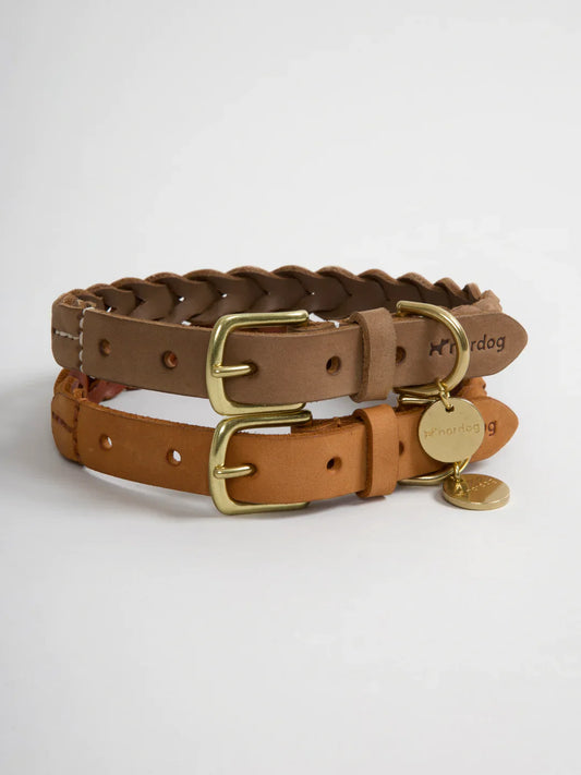 Nordog Hugo braided dog collar made of premium leather, featuring gold buckles and tags, available in cognac and nougat colors.
