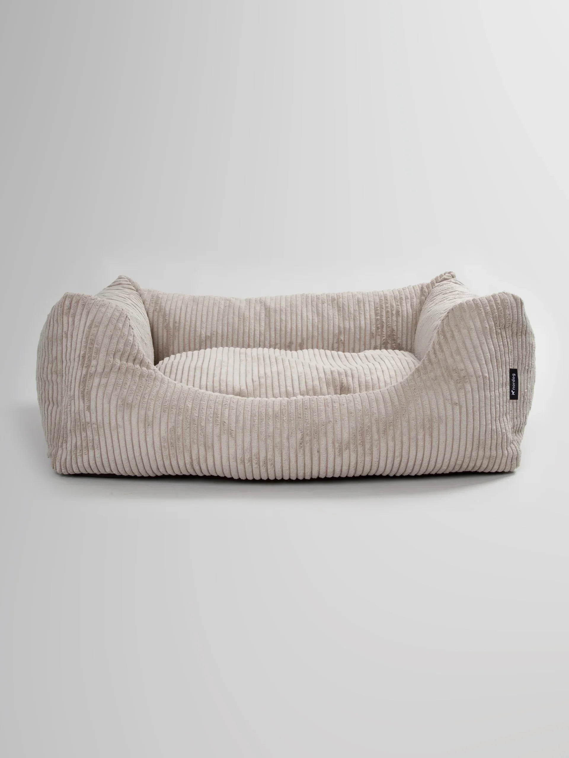 Beige velvet dog bed Oscar by Nordog, luxurious and comfortable.